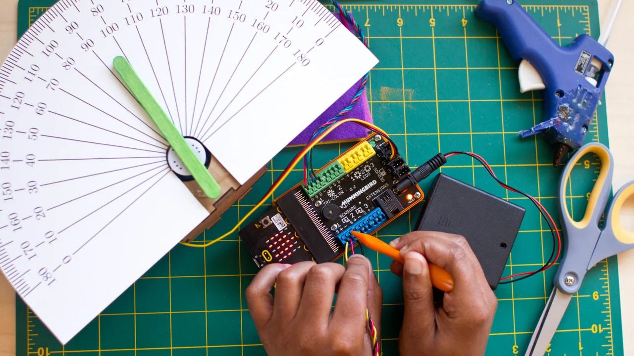 Hummingbird robotics kits let students build and code working robots from craft materials using the BBC micro:bit.