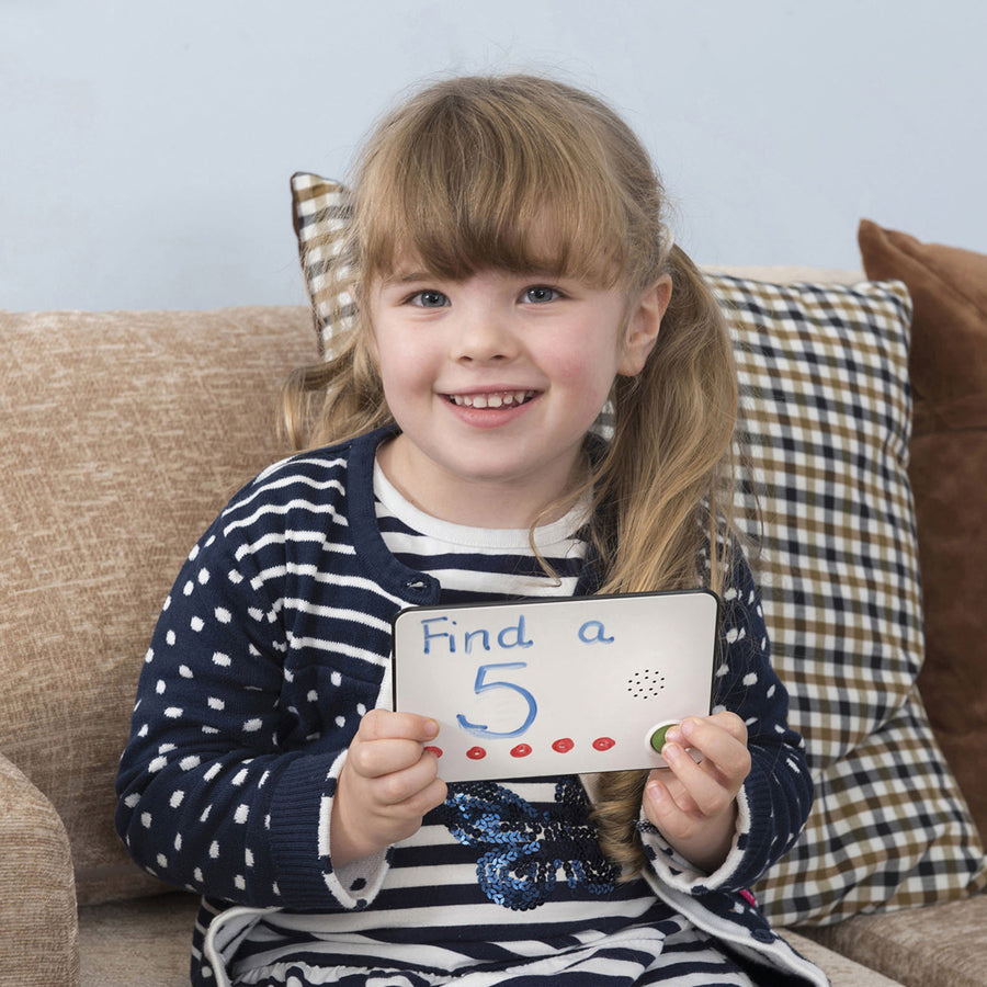 Child interacting with Premium Talk-Time Card in the classroom setting