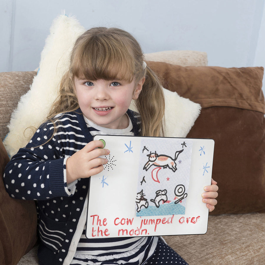 Child interacting with Premium Talk-Time Card in the classroom setting