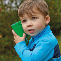 Child using See and Speak Recordable Binoculars 6-Pack in an outdoor setting