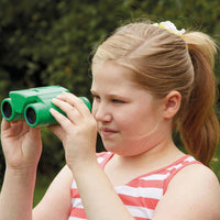 Child using See and Speak Recordable Binoculars 6-Pack in an outdoor setting
