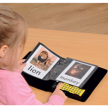 Child using Talking Photo Album to listen to a recorded story